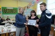 7 June 2012; Recieving their Primary School Programme Ceftificate of Achievement from Jack Hanratty, Leinster Rugby, are Annemarie Hogan, centre, Principal of St. Brigids Primary School, and Rachel Murphy, 5th class teacher. Leinster Rugby Dublin City Council Tag Fun Day, St. Brigids Primary School, Ballsbridge, Dublin. Picture credit: Barry Cregg / SPORTSFILE