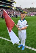 3 September 2017; Littlewoods flagbearer 8 year old Oisin Scanlon, from Liam Mellows GAA Club, Ballyloughane, Galway, at the GAA Hurling All-Ireland Senior Championship Final match between Galway and Waterford at Croke Park in Dublin. Photo by Ramsey Cardy/Sportsfile