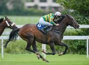 8 June 2012; Louisville Lip, with Fran Berry up, on their way to winning the RSM Farrell Grant Sparks Handicap. Leopardstown Racecourse, Leopardstown, Co. Dublin. Picture credit: Matt Browne / SPORTSFILE