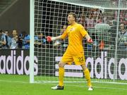 8 June 2012; Poland substitute goalkeeper Przemyslaw Tytón celebrates after saving a penalty with his first touch of the game. EURO2012, Group A, Poland v Greece, National Stadium, Warsaw, Poland. Picture credit: Pat Murphy / SPORTSFILE