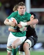 9 June 2012; Brian O'Driscoll, Ireland, is tackled by Adam Thomson, New Zealand. Steinlager Series 2012, 1st Test, New Zealand v Ireland, Eden Park, Auckland, New Zealand. Picture credit: Ross Setford / SPORTSFILE