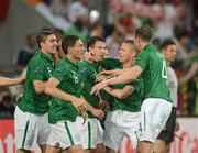 10 June 2012; Republic of Ireland's Sean St. Ledger, centre, celebrates with team-mates, from left to right, Stephen Ward, Keith Andrews, Damien Duff and John O'Shea, after scoring his side's equalising goal after 19 minutes. EURO2012, Group C, Republic of Ireland v Croatia, Municipal Stadium Poznan, Poznan, Poland. Picture credit: David Maher / SPORTSFILE