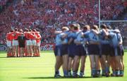 1 September 2002; Both teams huddle prior to the Bank of Ireland All-Ireland Senior Football Championship Semi-Final match between Armagh and Dublin at Croke Park in Dublin. Photo by Brian Lawless/Sportsfile