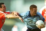 1 September 2002; Peadar Andrews of Dublin is tackled by Enda McNulty of Armagh during the Bank of Ireland All-Ireland Senior Football Championship Semi-Final match between Armagh and Dublin at Croke Park in Dublin. Photo by Damien Eagers/Sportsfile