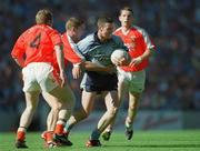 1 September 2002; Ray Cosgrove of Dublin in action against Kieran McGeeney and Francis Bellew of Armagh during the Bank of Ireland All-Ireland Senior Football Championship Semi-Final match between Armagh and Dublin at Croke Park in Dublin. Photo by Damien Eagers/Sportsfile