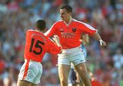 1 September 2002; Paddy McKeever of Armagh celebrates his side's only goal with teammate Diarmuid Marsden, left, during the Bank of Ireland All-Ireland Senior Football Championship Semi-Final match between Armagh and Dublin at Croke Park in Dublin. Photo by Damien Eagers/Sportsfile