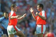 1 September 2002; Paddy McKeever of Armagh celebrates his side's only goal with teammate Diarmuid Marsden, right, during the Bank of Ireland All-Ireland Senior Football Championship Semi-Final match between Armagh and Dublin at Croke Park in Dublin. Photo by Damien Eagers/Sportsfile