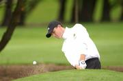 5 September 2002; Shane Gannon of Louth Golf Club plays from a bunker on the 18th hole during the Bulmers Junior Cup at Galway Golf Club in Galway. Photo by Ray McManus/Sportsfile