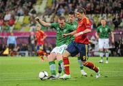 14 June 2012; Fernando Torres, Spain, goes past the challenge of Richard Dunne, Republic of Ireland, on his way to scoring his side's first goal after four minutes. EURO2012, Group C, Spain v Republic of Ireland, Arena Gdansk, Gdansk, Poland. Picture credit: Pat Murphy / SPORTSFILE