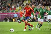 14 June 2012; Fernando Torres, Spain, goes past the challenge of Richard Dunne, Republic of Ireland, on his way to scoring his side's first goal after four minutes. EURO2012, Group C, Spain v Republic of Ireland, Arena Gdansk, Gdansk, Poland. Picture credit: Pat Murphy / SPORTSFILE