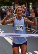 6 September 2017; Catherina McKeirnan approaches the line to finish first in the women's during the Grant Thornton Corporate 5K Team Challenge – Dublin Docklands 2017 in Dublin City Centre. Photo by Piaras Ó Mídheach/Sportsfile