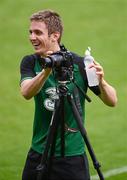 16 June 2012; Republic of Ireland's Kevin Doyle takes a picture at the end of squad training ahead of their UEFA EURO 2012, Group C, game against Italy on Monday. Republic of Ireland EURO2012 Squad Training, Municipal Stadium, Gdynia, Poland. Picture credit: David Maher / SPORTSFILE