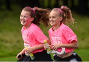 9 September 2017; Friends Jennifer Hynes, left, age 11, from Firhouse, Dublin, and Joy Ralph, age 11, from Greenhill, Dublin, run together during the Great Pink Run with Avonmore Slimline Milk in the Phoenix Park on Saturday, September 9th where over 6,000 women, men and children took part in the 7th year of this event with all funds supporting Breast Cancer Ireland’s pioneering research and awareness programme nationally. Photo by Cody Glenn/Sportsfile