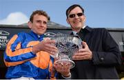 10 September 2017; Jockey Ryan Moore and trainer Aidan O'Brien celebrate with the trophy after winning the Comer Group International Irish St Leger on Order of St George during the Longines Irish Champions Weekend 2017 at The Curragh Racecourse in Co Kildare. Photo by Cody Glenn/Sportsfile