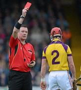 20 June 2012; Willie Deveraux, Wexford, is shown a red card by referee David Hughes. Bord Gáis Energy Leinster GAA Hurling Under 21 Championship Semi-Final, Kilkenny v Wexford, Nowlan Park, Kilkenny. Picture credit: Matt Browne / SPORTSFILE