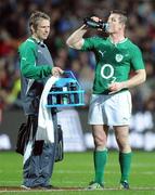 23 June 2012; Brian O'Driscoll, Ireland, and physio Cameron Steele, left, during the game. Steinlager Series 2012, 3rd Test, New Zealand v Ireland, Waikato Stadium, Hamilton, New Zealand. Picture credit: Ross Setford / SPORTSFILE