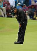 28 June 2012; Jeev Milkha Singh watches his birdie putt on the 18th Green on the way to the hole to take the outright lead, during the 2012 Irish Open Golf Championship. Royal Portrush, Portrush, Co. Antrim. Picture credit: Oliver McVeigh / SPORTSFILE