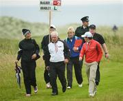 28 June 2012; Rory McILroy, along with his girlfriend tennis player Caroline Wozniacki, left, and his father Gerry on the 9th fairway during the 2012 Irish Open Golf Championship. Royal Portrush, Portrush, Co. Antrim. Picture credit: Matt Browne / SPORTSFILE