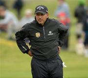 28 June 2012; Jeev Milkha Singh leaves the 18th green after holing his putt to take an early lead, during the 2012 Irish Open Golf Championship. Royal Portrush, Portrush, Co. Antrim. Picture credit: Oliver McVeigh / SPORTSFILE