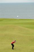 28 June 2012; Keegan Bradley plays his second shot to the 5th green during the 2012 Irish Open Golf Championship. Royal Portrush, Portrush, Co. Antrim. Picture credit: Matt Browne / SPORTSFILE
