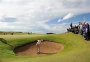 28 June 2012; Rory McIlroy, plays from a bunker on the 13th fairway during the 2012 Irish Open Golf Championship. Royal Portrush, Portrush, Co. Antrim. Picture credit: Matt Browne / SPORTSFILE