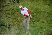 28 June 2012; Rory McIlroy watches his second shot from under a bush on the 15th fairway during the 2012 Irish Open Golf Championship. Royal Portrush, Portrush, Co. Antrim. Picture credit: Matt Browne / SPORTSFILE