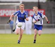 30 June 2012; Caoimhe O'Reilly, Cavan, in action against Kate McGrath, Waterford. All-Ireland U14 'B' Ladies Football Championship Final 2012, Cavan v Waterford, St Brendan’s Park, Birr, Co. Offaly. Picture credit: David Maher / SPORTSFILE