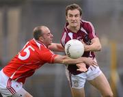 30 June 2012; Kevin Maguire, Westmeath, in action against Darren Clarke, Louth. GAA Football All-Ireland Senior Championship Qualifier Round 1, Westmeath v Louth, Cusack Park, Mullingar, Co. Westmeath. Picture credit: David Maher / SPORTSFILE