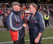 30 June 2012; Westmeath manager Pat Flanagan, right, with Louth selector Brian McEniff at the end of the game. GAA Football All-Ireland Senior Championship Qualifier Round 1, Westmeath v Louth, Cusack Park, Mullingar, Co. Westmeath. Picture credit: David Maher / SPORTSFILE