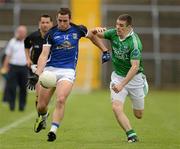 1 July 2012; Eugene Keating, Cavan, in action against Barry Owens, Fermanagh. GAA Football All-Ireland Senior Championship Qualifier Round 1, Fermanagh v Cavan, Brewster Park, Enniskillen, Co. Fermanagh. Picture credit: Oliver McVeigh / SPORTSFILE