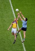 1 July 2012; Eamonn Fennell, Dublin, contests a high ball against Eric Bradley, Wexford. Leinster GAA Football Senior Championship Semi-Final, Dublin v Wexford, Croke Park, Dublin. Picture credit: Dáire Brennan / SPORTSFILE