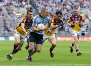 1 July 2012; Eoghan O'Gara, Dublin, in action against Adrian Flynn, left, and Graeme Molloy, Wexford. Leinster GAA Football Senior Championship Semi-Final, Dublin v Wexford, Croke Park, Dublin. Picture credit: David Maher / SPORTSFILE