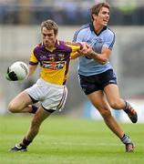 1 July 2012; Redmond Barry, Wexford, in action against Michael Fitzsimons, Dublin. Leinster GAA Football Senior Championship Semi-Final, Dublin v Wexford, Croke Park, Dublin. Picture credit: David Maher / SPORTSFILE