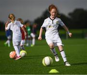 14 September 2017; Allanah Ferrari, age 9, from Irishtown, Dublin, during the Aviva Soccer Sisters Golden Camp. Forty girls from the Aviva ‘Soccer Sisters’ initiative were given the opportunity of a lifetime, as they took part in a special training session alongside several members of the Republic of Ireland women’s senior team. The girls were selected from over 4,000 budding footballers between the ages of seven and 12 to take part in the special session at the FAI National Training Centre, as part of the 2017 Aviva Soccer Sisters Golden Camp. The Camp saw the girls sit in on a full Irish team training session, before taking to the field with the team ahead of next Tuesday’s FIFA World Cup Qualifier against Northern Ireland. The Aviva Soccer Sisters programme has been running since 2010 and is aimed at engaging young girls in physical exercise and attracting them to the game of football. Over 30,000 girls have taken part in the programme since it first kicked off, including Roma McLaughlin who is part of Colin Bell’s line-up for next week’s qualifier.  For further information on Aviva Soccer Sisters, visit: www.aviva.ie/soccersisters  #AvivaSoccerSisters. FAI National Training Centre, Abbotstown, Dublin. Photo by Stephen McCarthy/Sportsfile