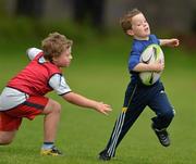 4 July 2012; Gavin McNichol, right, in action against Ben Merry as they work on their skills while enjoying the first bit of sun this summer at the Old Belvedere RFC VW Leinster Rugby Camp. Anglesea Road, Donnybrook, Dublin. Picture credit: Barry Cregg / SPORTSFILE