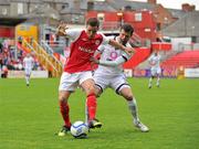 5 July 2012; Darren Meenan, St. Patrick's Athletic, in action against Matt Garner, ÍBV Vestmannaeyjar. UEFA Europa League First Qualifying Round First Leg, St. Patrick's Athletic v ÍBV Vestmannaeyjar, Richmond Park, Dublin. Picture credit: Barry Cregg / SPORTSFILE