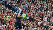 17 September 2017; Mayo supporters celebrate a score as Dublin goalkeeper Stephen Cluxton prepares to take a kickout during the GAA Football All-Ireland Senior Championship Final match between Dublin and Mayo at Croke Park in Dublin. Photo by Piaras Ó Mídheach/Sportsfile