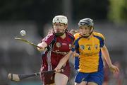 7 July 2012; Martina Conroy, Galway, in action against Carol O'Leary, Clare. All-Ireland Senior Camogie Championship, Round Three, Clare v Galway, Cusack Park, Ennis, Co. Clare. Picture credit: Ray McManus / SPORTSFILE