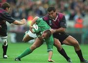 28 September 2002; Keith Gleeson of Ireland is tackled by Kakha Alani of Georgia during the Rugby World Cup 2003 Qualifier match between Ireland and Georgia at Lansdowne Road in Dublin. Photo by Brendan Moran/Sportsfile