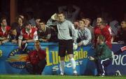 27 September 2002; Shamrock Rovers goalkeeper Tony O'Dowd is taunted by St Patricks Athletic supporters during the eircom League Premier Division match between St. Patrick's Athletic and Shamrock Rovers at Richmond Park in Dublin. Photo by Damien Eagers/Sportsfile