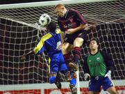 2 October 2002; Glen Crowe of Bohemians in action against Avery John of Longford Town during the eircom League Premier Division match between Bohemians and Longford Town at Dalymount Park in Dublin. Photo by David Maher/Sportsfile