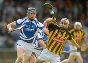 11 July 2012; Kevin Kelly, Kilkenny, in action against Jim Fitzpatrick, Laois. Bord Gais Energy Leinster GAA Hurling Under 21 Championship Final, Laois v Kilkenny, O'Moore Park, Portlaoise, Co. Laois. Picture credit: Pat Murphy / SPORTSFILE