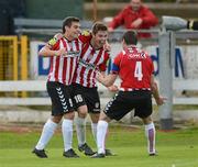 13 July 2012; Derry City's David McDaid, left, celebrates with team-mates Conor Murphy, centre, and Barry Molloy after scoring his side's first goal. Airtricity League Premier Division, Derry City v Sligo Rovers, Brandywell, Derry. Picture credit: Oliver McVeigh / SPORTSFILE