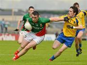 15 July 2012; Shane Hennelly, Mayo, in action against Cathal Kenny, Roscommon. Connacht GAA Football Minor Championship Final, Mayo v Roscommon, Dr. Hyde Park, Roscommon. Picture credit: Barry Cregg / SPORTSFILE