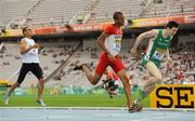 15 July 2012; Ireland's Mark English, beats Brandon McBride, centre, Canada, and Mohamed Belbachir, left, Algeria, on the line in the Men's 800m Final, where he finished in 5th place in a time of 1:46.02sec. IAAF World Junior Athletics Championships, Montjuïc Olympic Stadium, Barcelona, Spain. Picture credit: Brendan Moran / SPORTSFILE