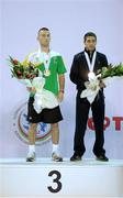 8 October 2011; John Joe Nevin, Cavan B.C., representing Ireland, after being presented with his 2011 AIBA World Boxing Championships 56kg bronze medal alongside fellow bronze medalist Anvar Yunusov, Tajikistan. 2011 AIBA World Boxing Championships. Heydar Aliyev Sports and Exhibition Complex, Baku, Azerbaijan. Picture credit: Stephen McCarthy / SPORTSFILE