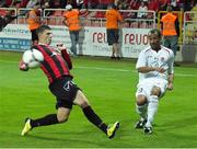 19 July 2012; Romauld Boco, Sligo Rovers, in action against Michal Habánek, Spartak Trnava. UEFA Europa League, 2nd Qualifying Round, 1st Leg, Spartak Trnava v Sligo Rovers, Antona Malatinského, Trnava, Slovakia. Picture credit: Michal Hlavatovic / SPORTSFILE