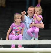 22 July 2012; Nigel Boyde, from Ballymena, Co. Antrim, enjoys the day's racing with his daughters Leah and Megan. Curragh Racecourse, the Curragh, Co. Kildare. Picture credit: Matt Browne / SPORTSFILE