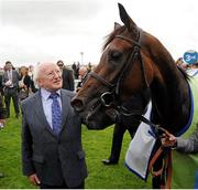 22 July 2012; President of Ireland Michael D. Higgins with Great Heavens, winner of the Darley Irish Oaks. Curragh Racecourse, the Curragh, Co. Kildare. Picture credit: Matt Browne / SPORTSFILE