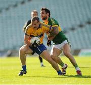 28 July 2012; Laurence Healy, Clare, in action against Paul Galvin, Kerry. GAA Football All-Ireland Senior Championship Qualifier, Round 4, Kerry v Clare, Gaelic Grounds, Limerick. Picture credit: Diarmuid Greene / SPORTSFILE